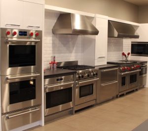 Wolf ovens, ranges, dishwasher and a microwave